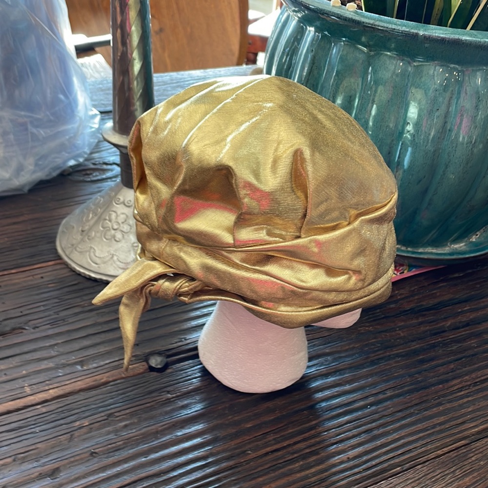 Vintage Bullock’s Gold Lame’ Turban.